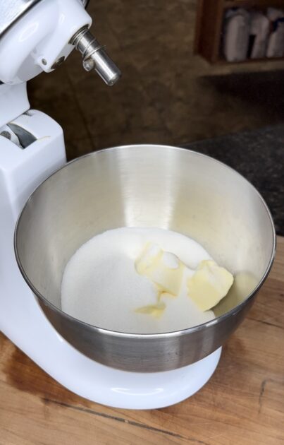 Butter and sugar in mixing bowl