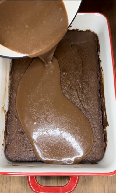 Pouring chocolate frosting